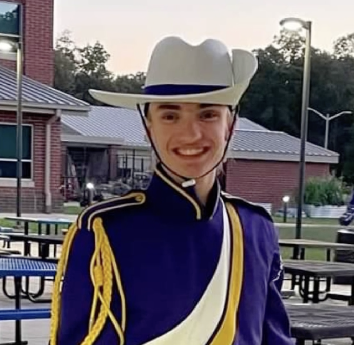 College marching band member in uniform